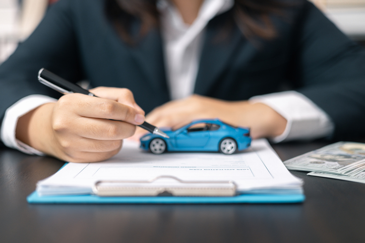 offered various finance options, including an auto loan or lease, making it easier to buy or rent a car from the company. Agent reviewed contract, finalizing insurance agreement.