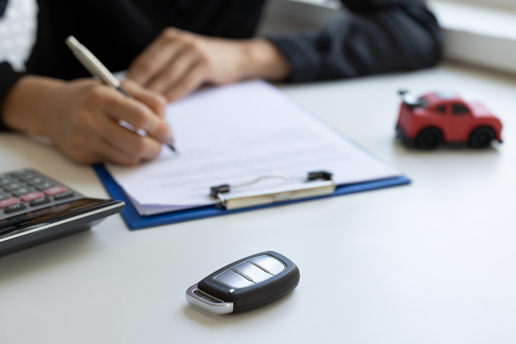 Woman deal to agreement successful car loan contract with customer